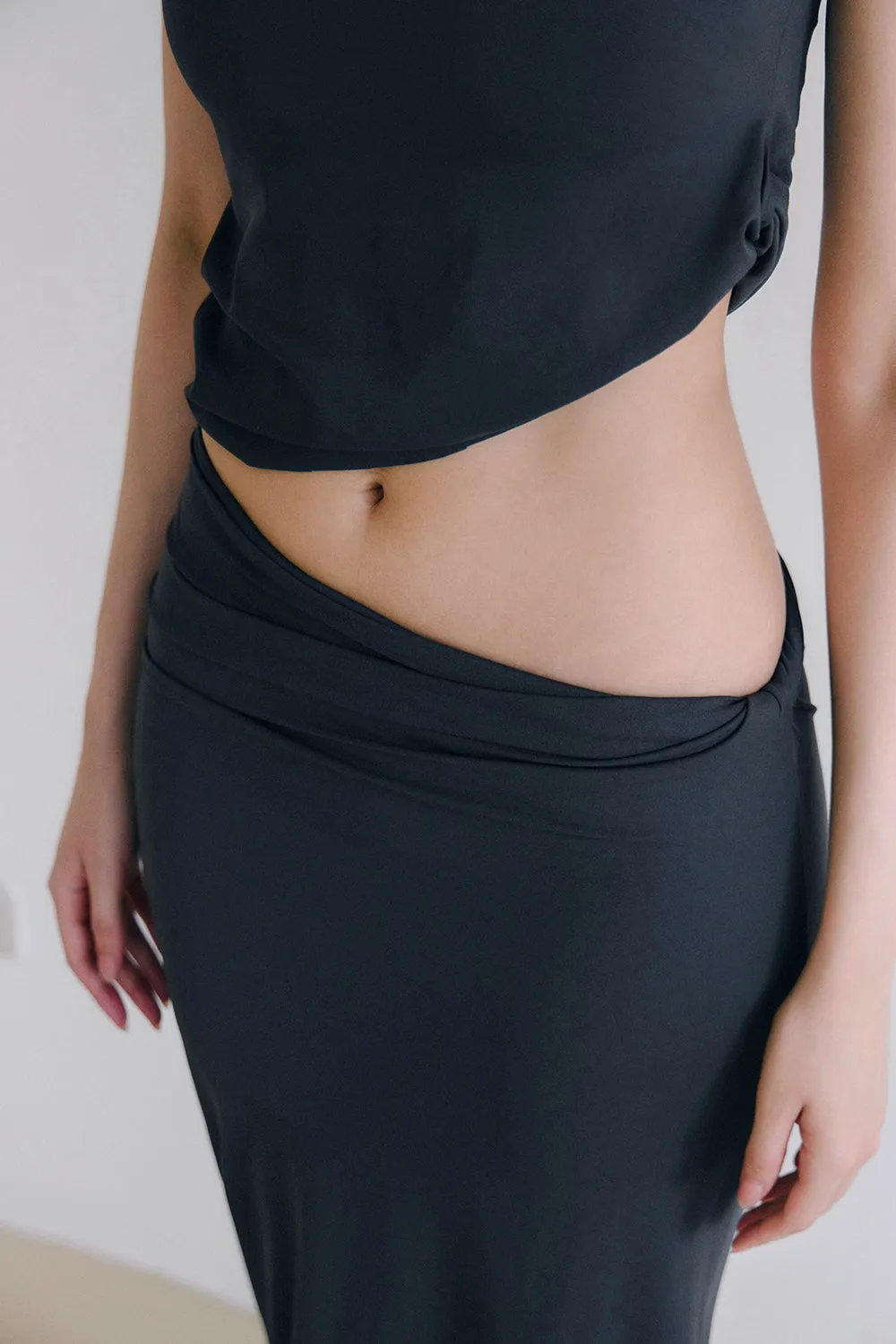奶蓋扭結設計長裙<br>mumm SOFT STRETCH SKIRT